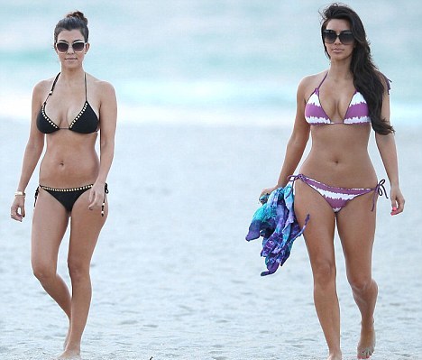 Kim Kourtney Kardashian were recently spotted frolicking on the beach in 